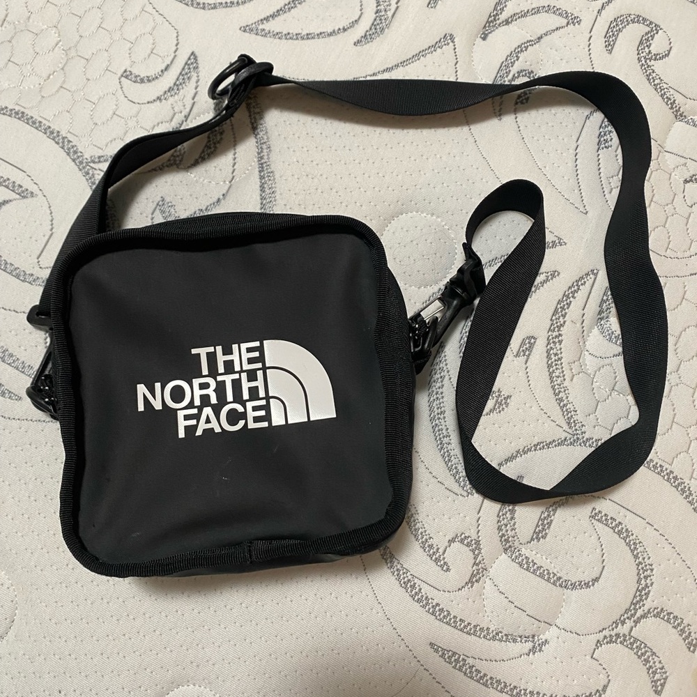 The North Face Black Belt Bag with Adjustable Strap and Durable Fabric